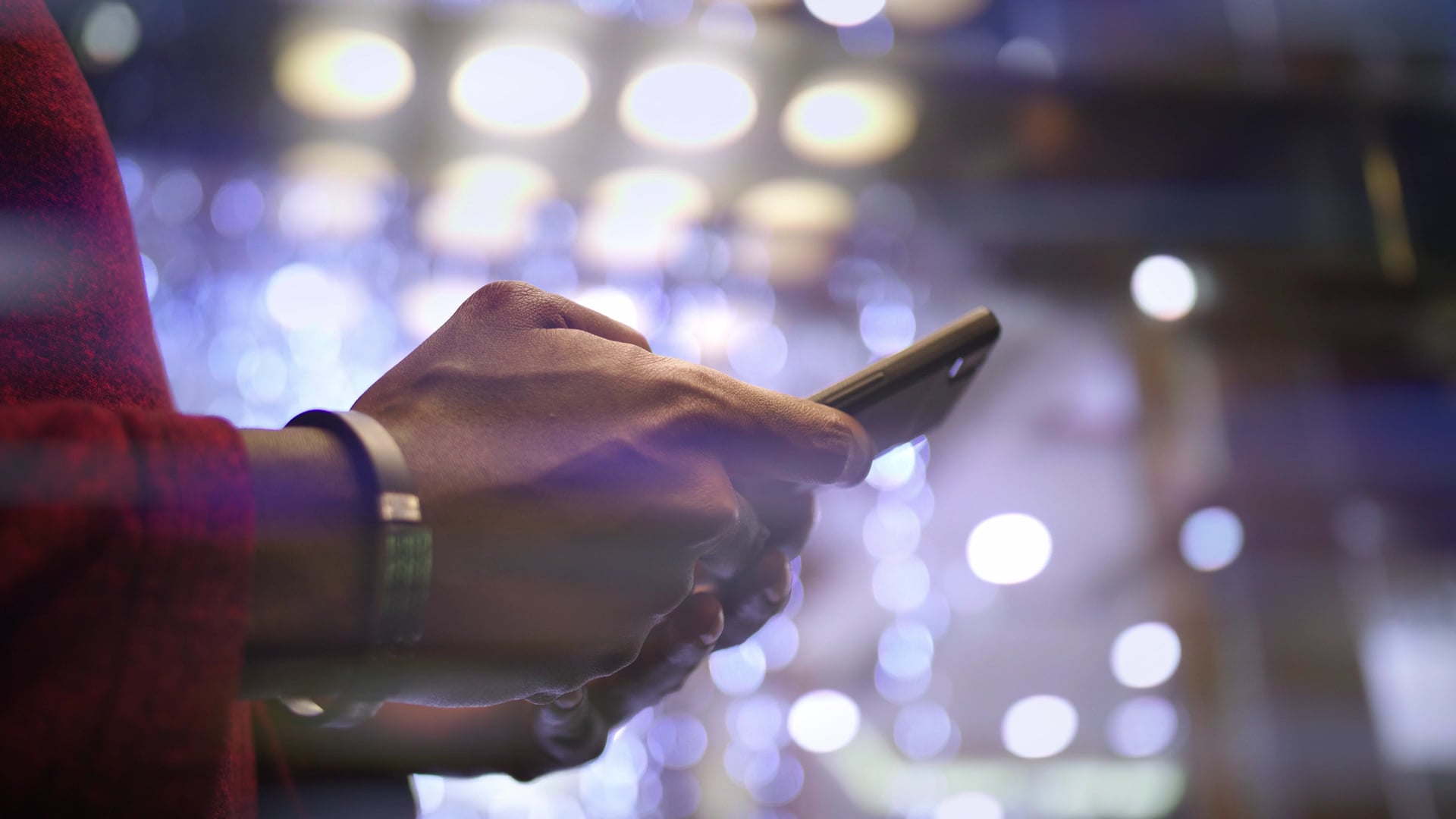 man_using_a_smartphone_riding_in_a_glass_elevator_by_Dmitrii_Borovikov_Artgrid-HD_H264-HD
